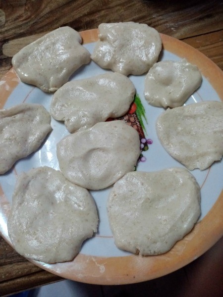 flattened dough rounds on plate