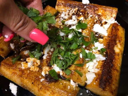 sprinkled cheese & cheese on zucchini