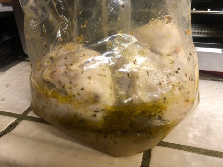 Plastic bag with Game Hens & marinade