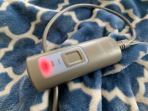 Close up of an electric blanket cord.