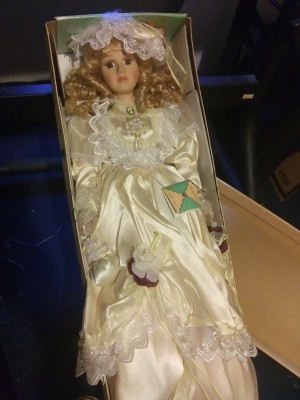 Value of a Carolynn's Collection Porcelain Doll - doll, perhaps a bride, in a white satin dress, still in the box