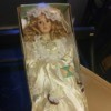 Value of a Carolynn's Collection Porcelain Doll - doll, perhaps a bride, in a white satin dress, still in the box