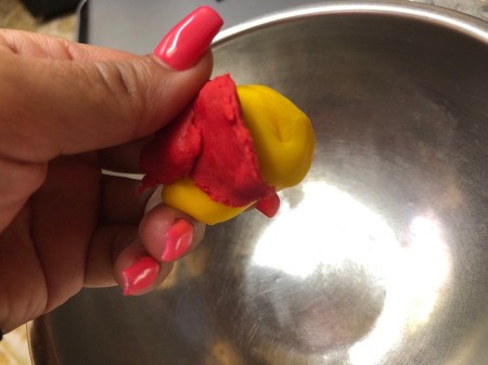 Fondant Sushi Cupcake Toppers - mix red and yellow fondant,  twist and knead until it is a peach-orange color for the salmon