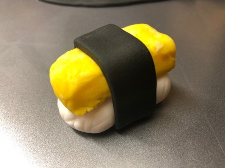 Fondant Sushi Cupcake Toppers - cut a long rectangle from the rolled black fondant and wrap around the egg and rice sushi
