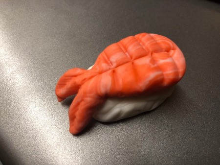 Fondant Sushi Cupcake Toppers - make a white rectangle, add indentations, and lay the shrimp on top with the tail draped over the edge