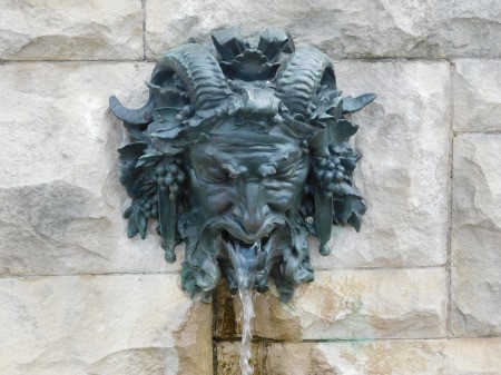 An old fountain depicting Bacchus, god of wine.