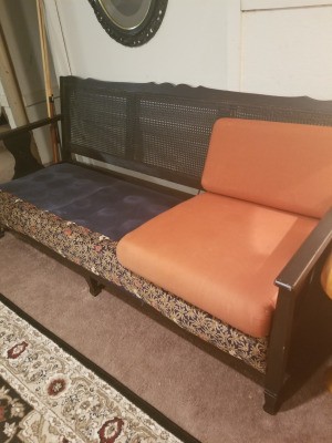 Value of a Vintage Rattan Backed Couch - vintage couch with peach colored cushions