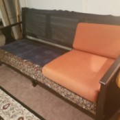 Value of a Vintage Rattan Backed Couch - vintage couch with peach colored cushions