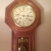 Value of a Regulator Wall Clock - wall clock with a pendulum