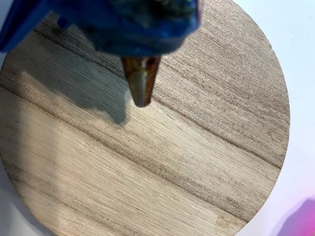 Upcycled Plastic Egg Mini Planter - hot glue the egg planter to the base