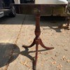 Value of a Mersman Table - round pedestal table with three legs and a drawer