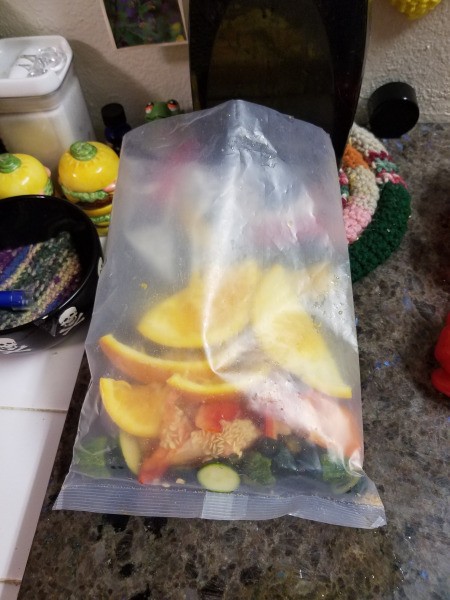 A plastic bag used to collect food scraps.