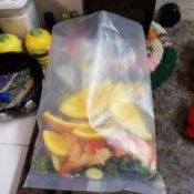 A plastic bag used to collect food scraps.