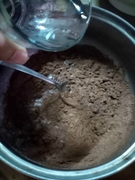 adding water to chocolate milk