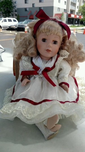 Replacement Certificate of Authenticity for Collectors Choice Doll - blond doll wearing a white dress trimmed with red ribbon
