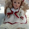 Replacement Certificate of Authenticity for Collectors Choice Doll - blond doll wearing a white dress trimmed with red ribbon