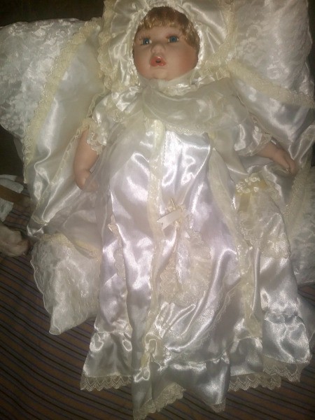 Information on a Cathay Collection Doll - baby doll in christening dress