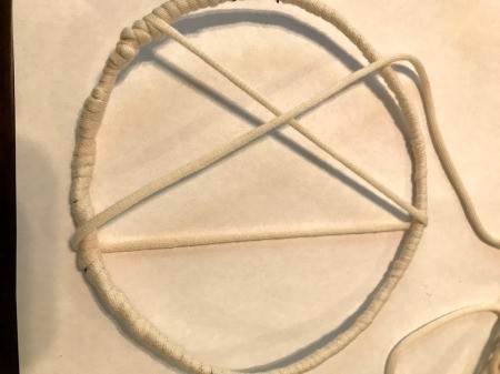 Dreamcatcher with Wooden Beads - begin creating your pattern with the yarn - wrapping it into your desired shape