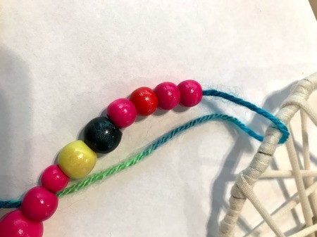 Dreamcatcher with Wooden Beads - attach the string of beads to the bottom center of the dreamcatcher