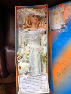 Value of an Ashley Belle Doll - doll wearing a white ensemble