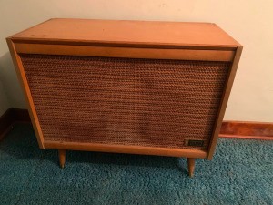 Value of Zenith Cabinet Record Player - rather plain stereo cabinet with large area covered with cloth over the speakers