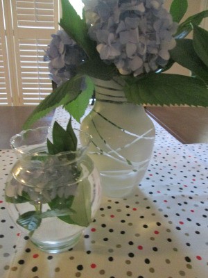Rubber Band Art Painted Vase - white vase and a smaller clear vase arrangement