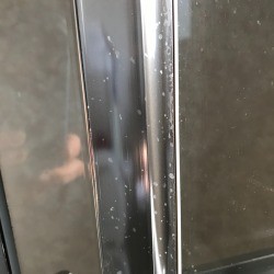 Rubbing Alcohol Removes Hairspray Buildup - hairspray spots on shower door and frame