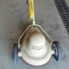 Value of a Vintage Rumsey Electric Mower - tan teardrop shaped mower