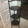 Value of an Antique 3 Tier Table - dark wood round tiered table