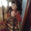 Value of this Dynasty Doll - doll in a glass case