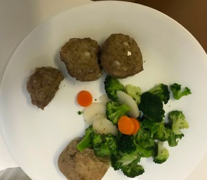 meatballs on plate with mixed veggies