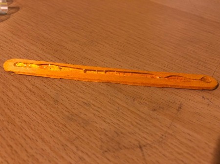 Popsicle Stick and Straw Compass - apply a line of hot glue to one side of a Popsicle stick