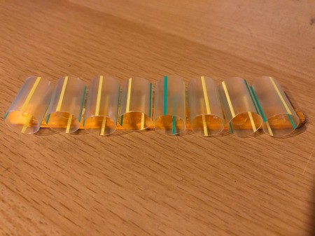 Popsicle Stick and Straw Compass - lay the straw pieces down across the hot glue