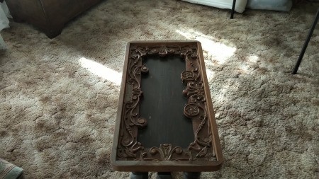 A small carved vintage table.