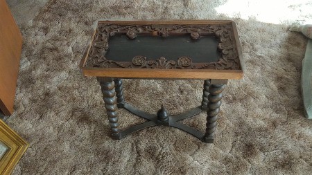 A small carved vintage table.