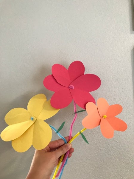 Heart Flowers Decoration - hand holding flowers by the pipe cleaner stems