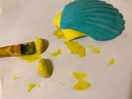 Make a Tropical Fish from Shells - paint the outside of the pistachio shells the same color as the tail and allow to dry