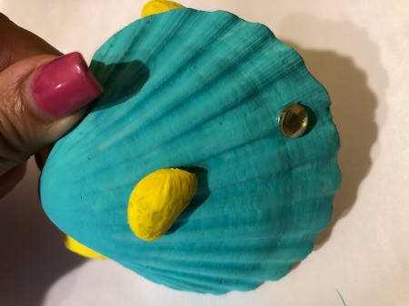Make a Tropical Fish from Shells - glue gem or googly eye to the front