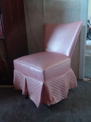 Identifying a Small Pink Chair - pink upholstered chair with a quilted skirt