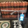 Value of a Set of World Popular Encyclopedias - books on a shelf