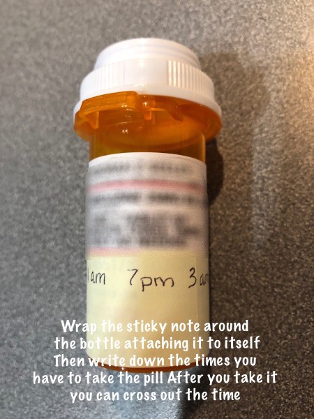 A post-it note strip as a pill reminder.