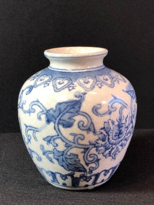 Value of a Blue and White Asian Jar - jar with a blue floral pattern on white background