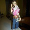 Identifying a Porcelain Doll - doll wearing jeans and boots