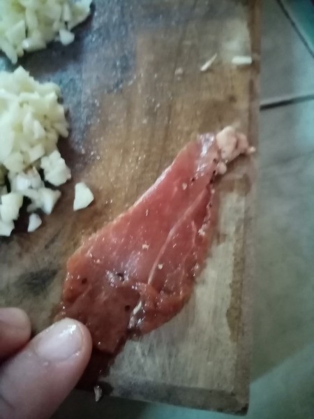 slicing Pork Steak