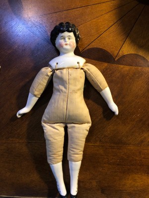 Identifying an Old Porcelain Doll - cloth bodied porcelain doll
