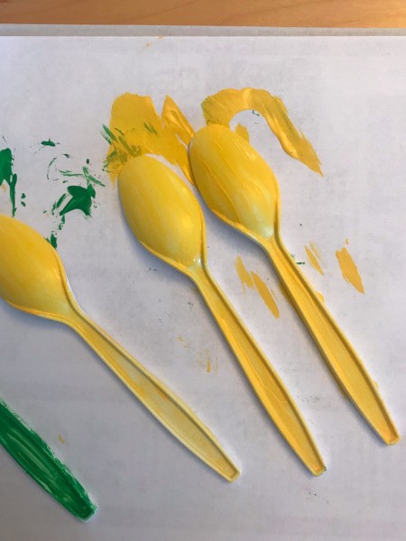 Plastic Spoon Plant Markers for Your Herb Garden - paint spoons and allow to dry