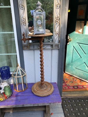 Finding the Value of Antique and Vintage Furniture - table with attached candle holder