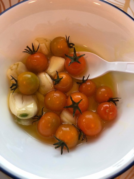 tomatoes, garlic & oil in bowl