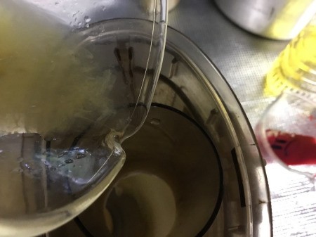 adding lemon juice to processor