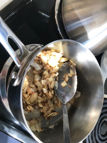 spiced browned onions in pan